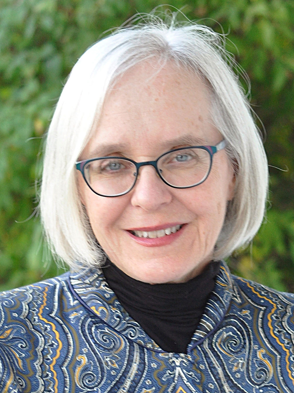 photo: Patti Grayson's face in front of green background
